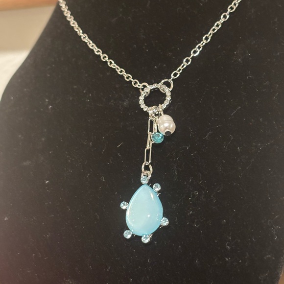 Emberly Elegant Silver Tone Necklace with Teardrop Blue Pendant - Picture 4 of 8